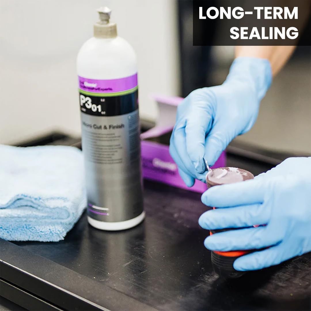 Person applying a sealant to a car part with gloves on, next to a bottle of Koch Chemie Micro Cut & Finish P3.01 polishing compound