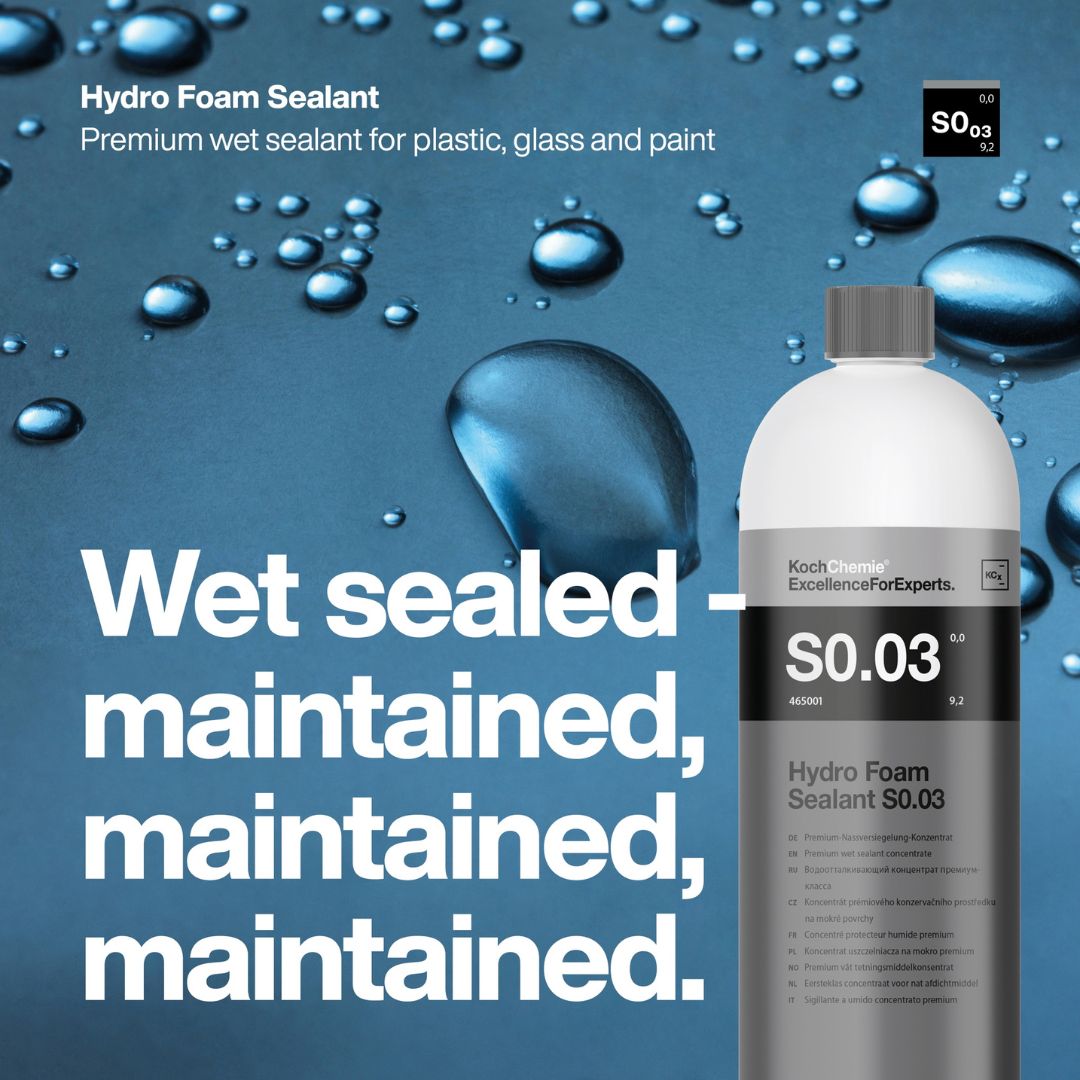 Koch Chemie Hydro Foam Sealant S0.03 bottle with water droplets on a blue background