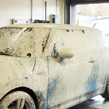 Car covered in Koch Chemie Hydro Foam at a car wash