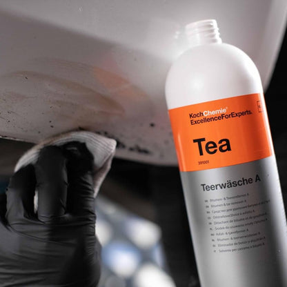 Koch Chemie Tea cleaning product with a gloved hand applying it to a surface.
