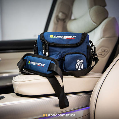 Blue cosmetic bag with Labocosmetica branding on a car seat. Labocosmetica Conibag - Detailing Shoulder Bag (Size S)
