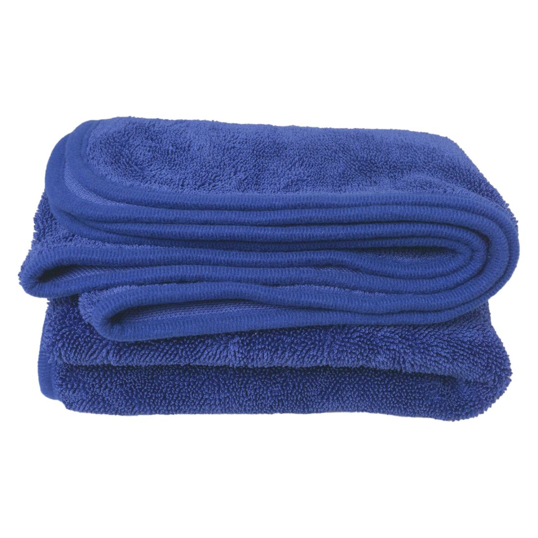 blue Labocosmetica drying towel on white background
