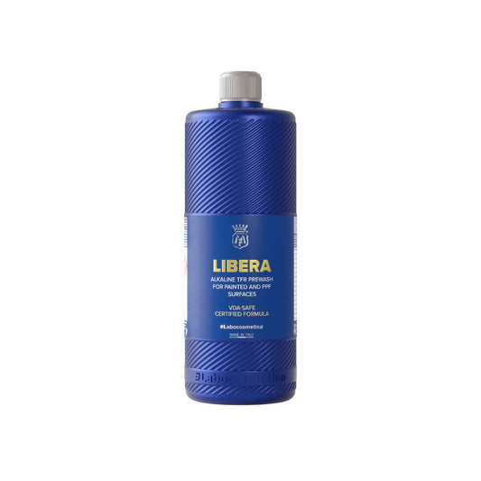 Blue bottle of Labocosmetica Libera on a white background