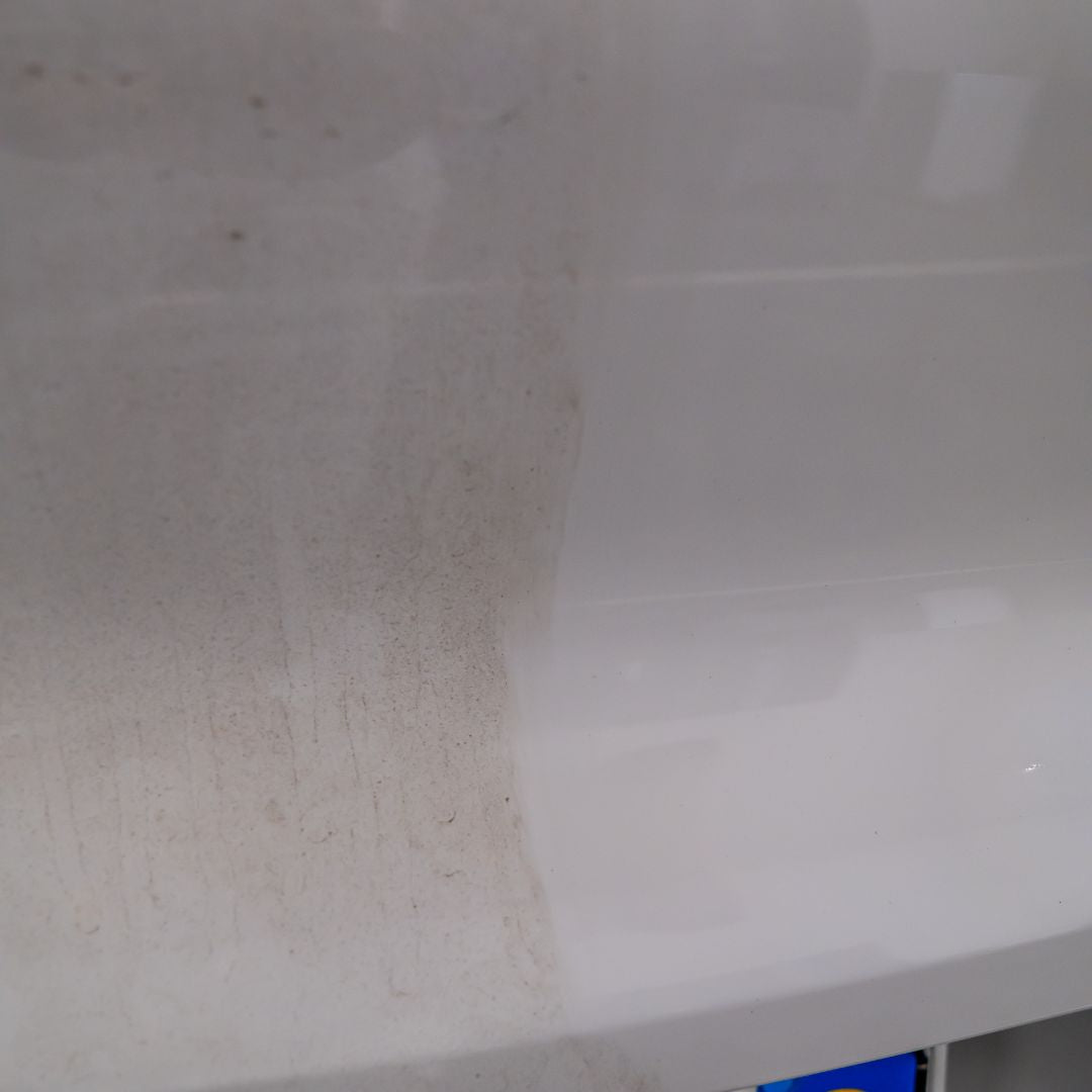 Close-up of a white surface 50:50 shot with clean PPF