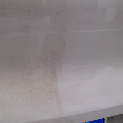 Close-up of a white surface 50:50 shot with clean PPF