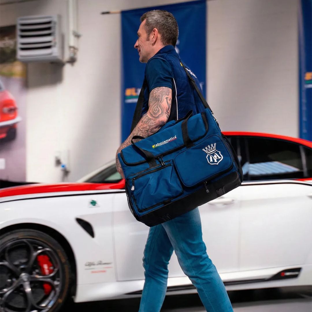 Man carrying a blue tool bag with a car in the background, Labocosmetica Multi Tool Bag – Large Detailing & Polisher Bag (Size L)