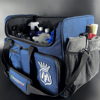 Blue sports bag with various items and a logo on a dark background. Labocosmetica Multi Tool Bag – Large Detailing & Polisher Bag (Size L)