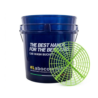 A dark blue plastic car wash bucket with white text, shown alongside a bright green circular grit guard on a plain white background.
