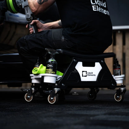 Person using a roller with 'Liquid Element' branding in a skateboarding context.
