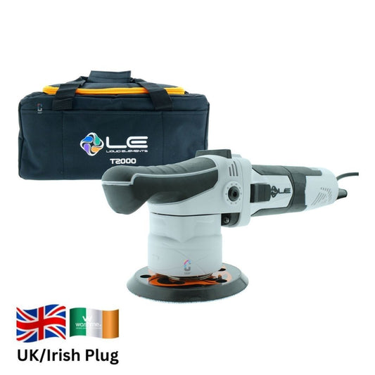 A white and grey Liquid Elements T2000 orbital polishing machine with a black sanding disc, shown in front of a black carrying bag with yellow accents. UK/Irish plug flags are at the bottom left on a white background.