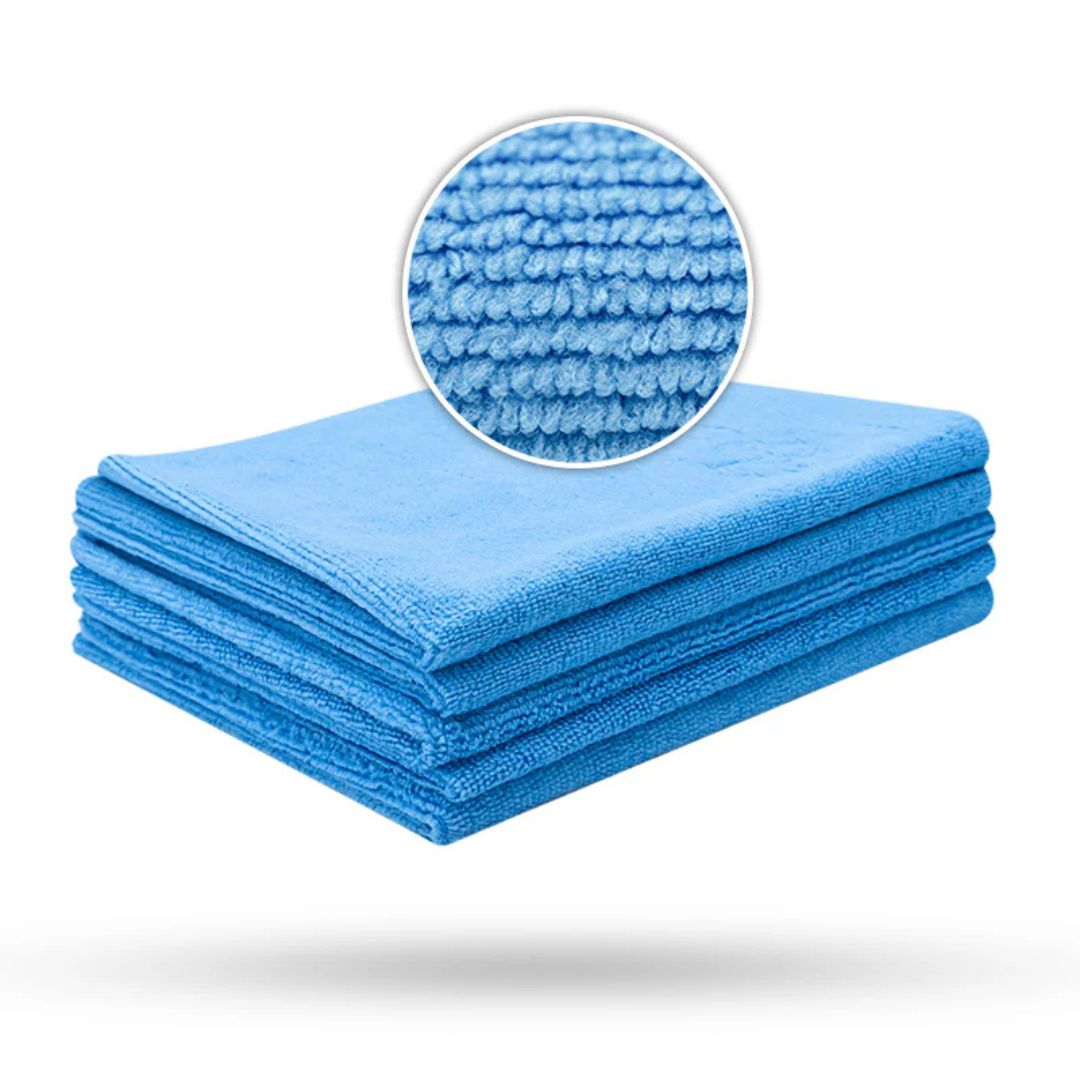 Stack of blue Liquid Elements Value microfibre cloths with a close-up of the fabric texture on a white background.
