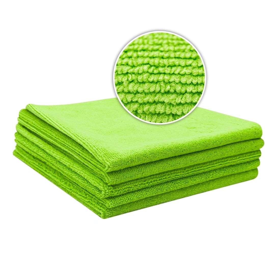 Stack of green Liquid Elements Value microfibre cloths with a close-up of the fabric texture on a white background.