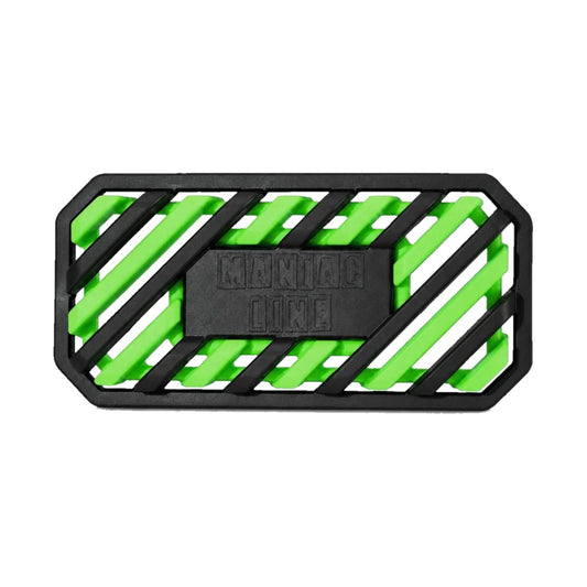 A rectangular black rubber maniac car air freshener with a slotted design, featuring bright neon green accents and a central black block embossed with the brand name 'MANIAC LINE'.