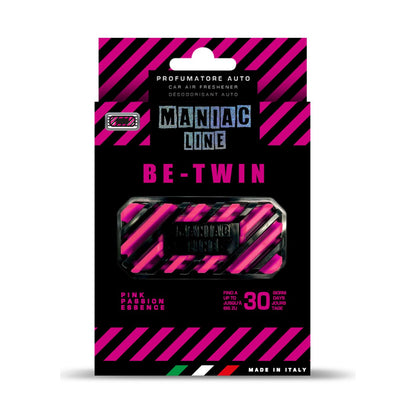 Packaged car air freshener spray labeled 'Maniac Line Be-Twin'  in a black card-style box with bright pink diagonal stripes and a small clear window showing the spray can inside.