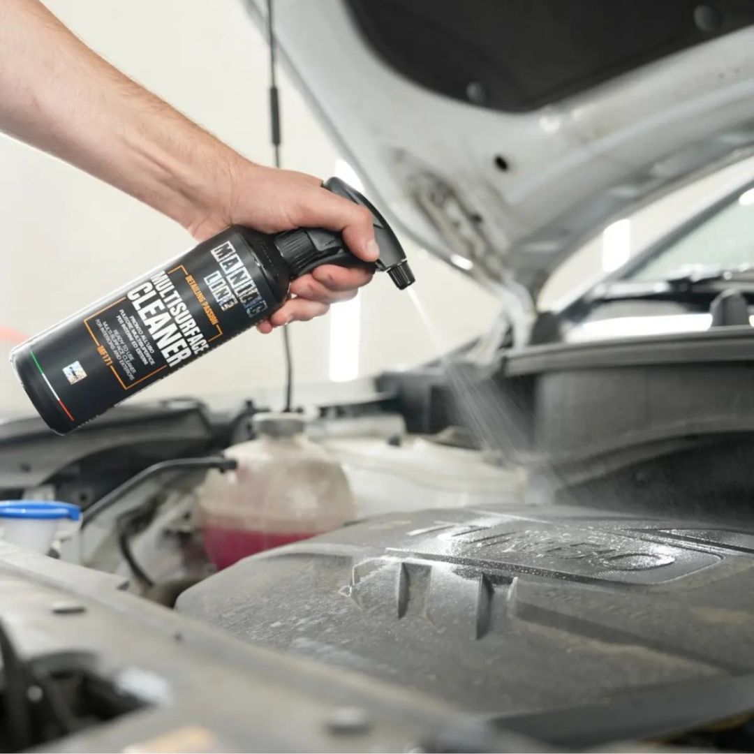 Maniac Multisurface Cleaner sprayed into engine bay to do an engine detail