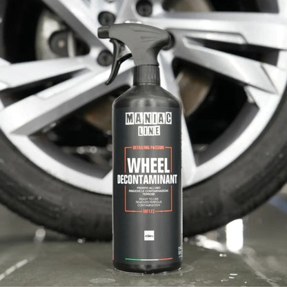 Maniac Wheel Decontaminant 1L (High-Cling Wheel Cleaner) in front of VW wheel
