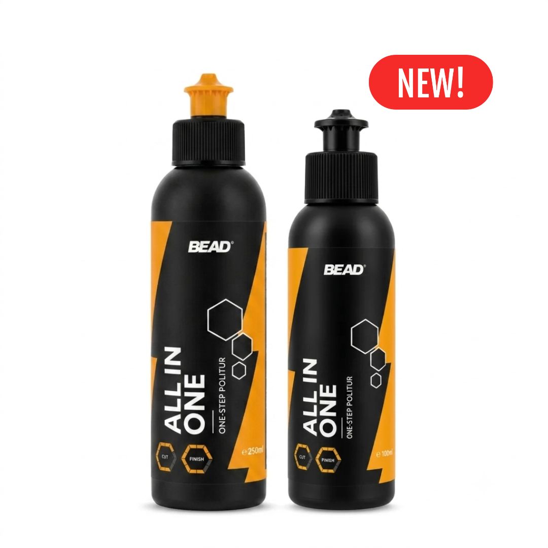 Two BEAD All In One one-step polisher bottles on a white background, one with a trigger sprayer and one with a pump, both black with orange graphics and a red 'NEW!' badge.