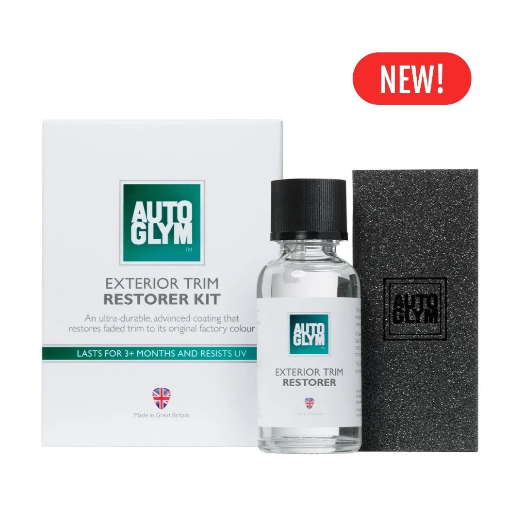 Autoglym exterior trim restorer kit with bottle, box, and black applicator on a white background