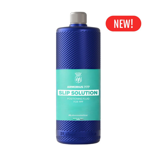 1000ml bottle of Labocosmetica Armorius Slip Solution Positioning Fluid for PPF, featuring a textured blue bottle with a teal label and a grey cap, shown on a white background with a red 'NEW!' badge.