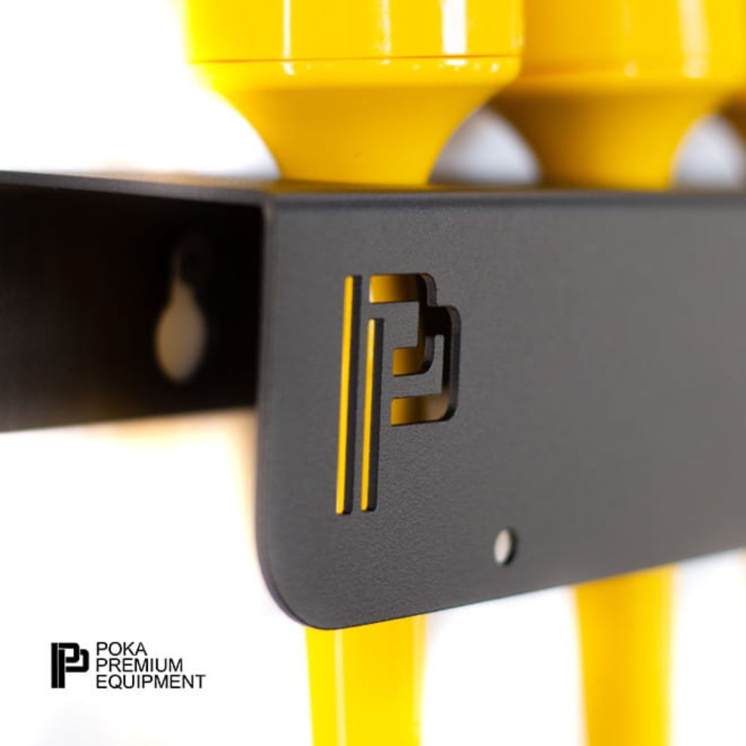 Close-up of a yellow and black equipment piece with 'Poka Premium Equipment' branding.