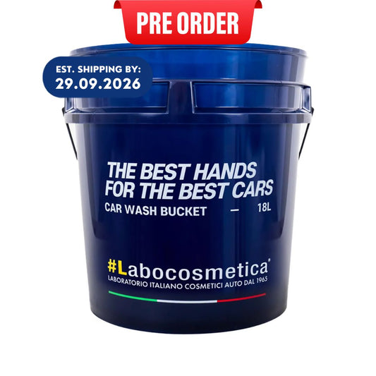 A dark blue plastic car wash bucket with white text reading 'THE BEST HANDS FOR THE BEST CARS', 'CAR WASH BUCKET', '18L', and the brand name '#Labocosmetica'. A red 'PRE ORDER' banner is at the top, and a blue shipping estimate badge appears on the left, all on a white background.