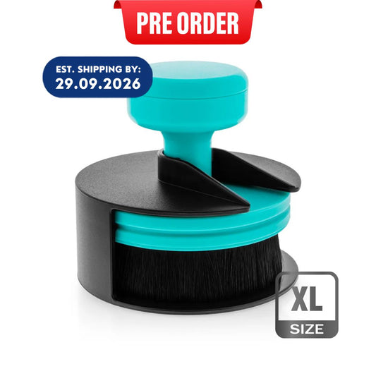 A turquoise and black circular Tyre dressing brush attachment with a cylindrical base and upright handle, shown on a white background with a red 'PRE ORDER' banner, a blue shipping date badge, and an 'XL SIZE' label.