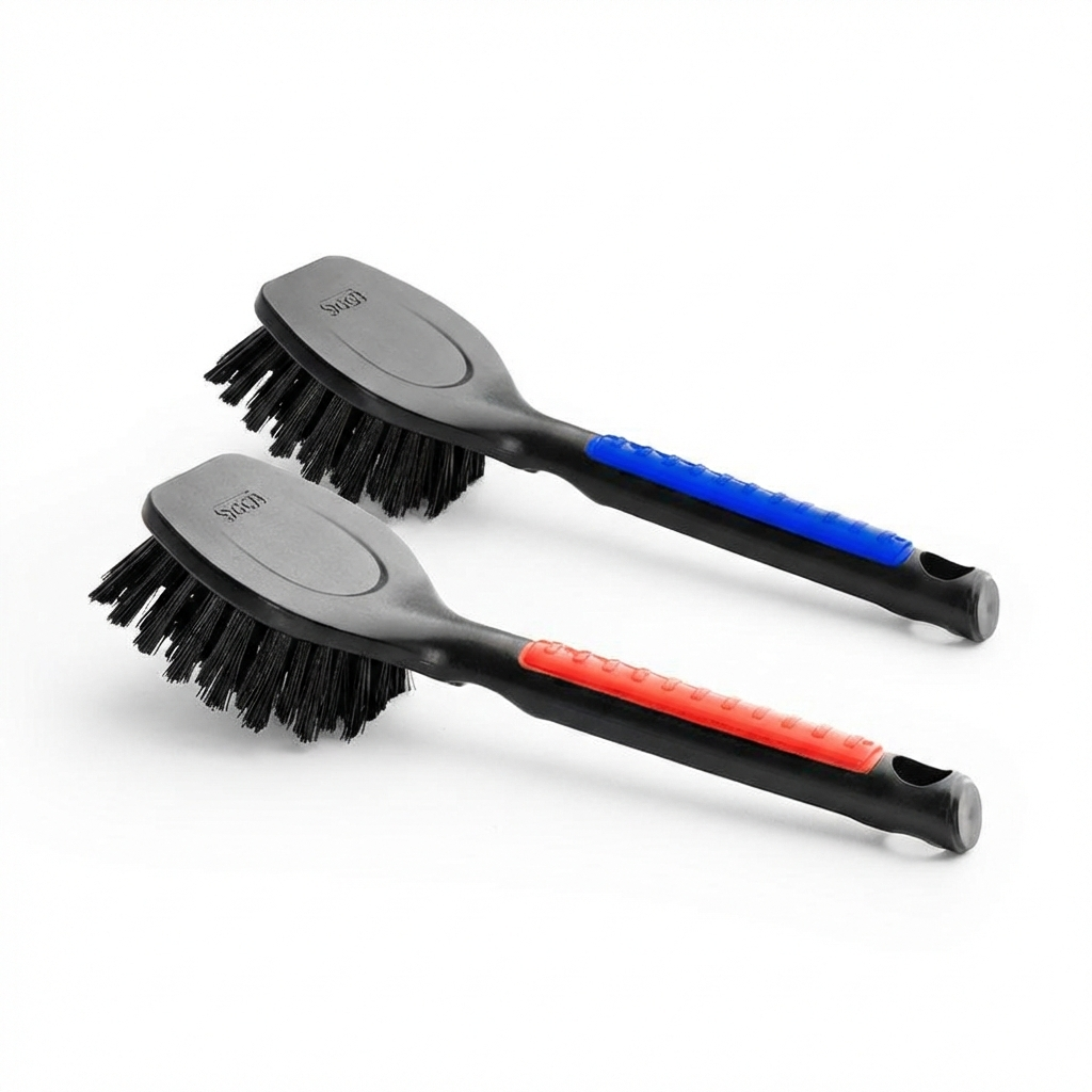 Two SGCB Tyre brushes with black bristles and blue or red handles on a white background. SGCB Ireland
