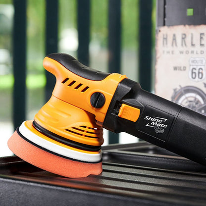 Shinemate ERO600 G2 car polisher on a car surface with a blurred background