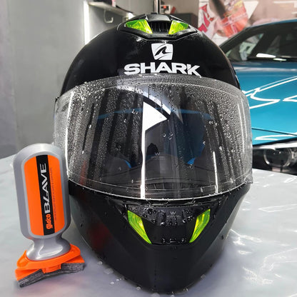 Black motorcycle helmet with clear visor and 'Shark' branding, next to Soft99 Glaco Blave - Glass & Plastic Water Repellent 70ml