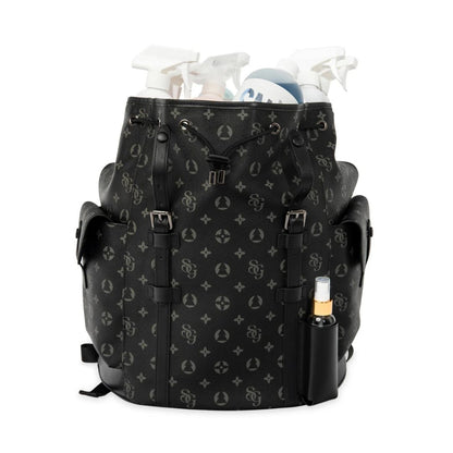 Black patterned backpack with golf clubs and accessories on a white background