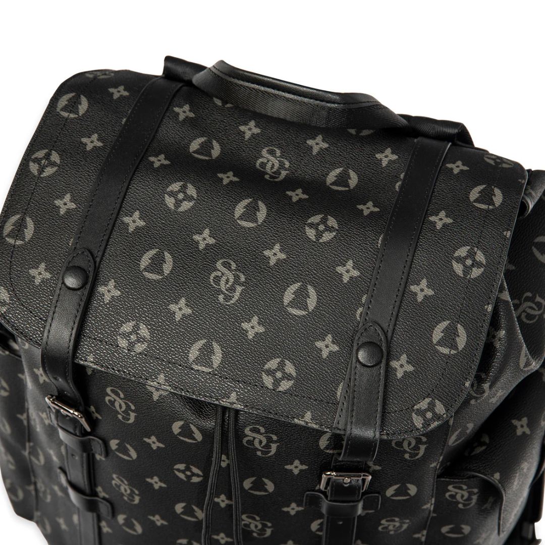 Black leather bag with brand logo pattern on a white background