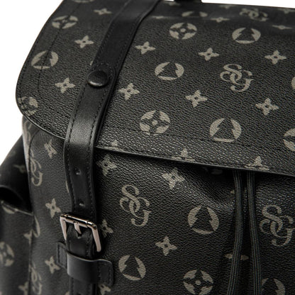 Black backpack with white monogram pattern on a white background