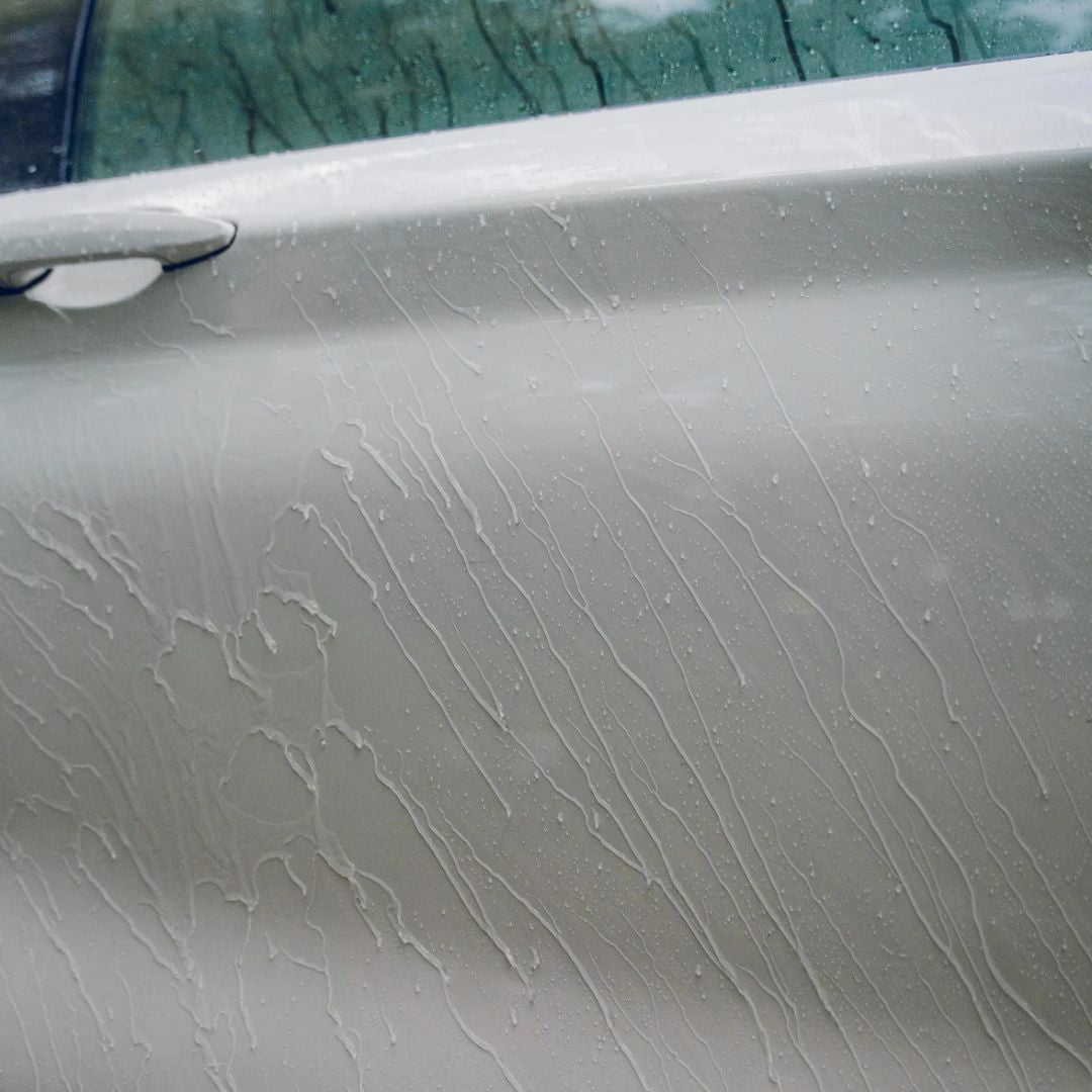 water beading on car door