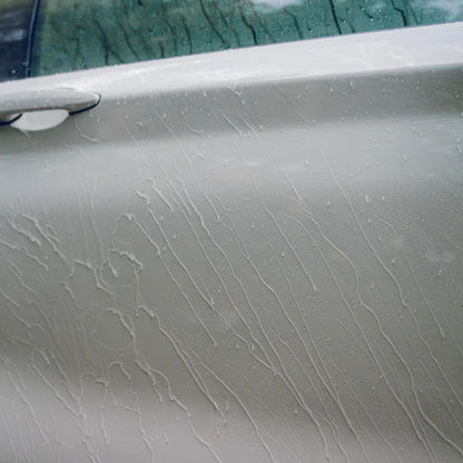 water beading on car door