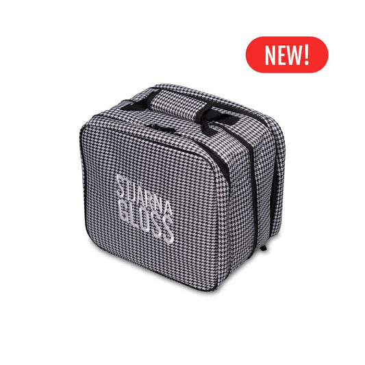 Black and white checkered bag with 'Stjarna Gloss' branding on a white background
