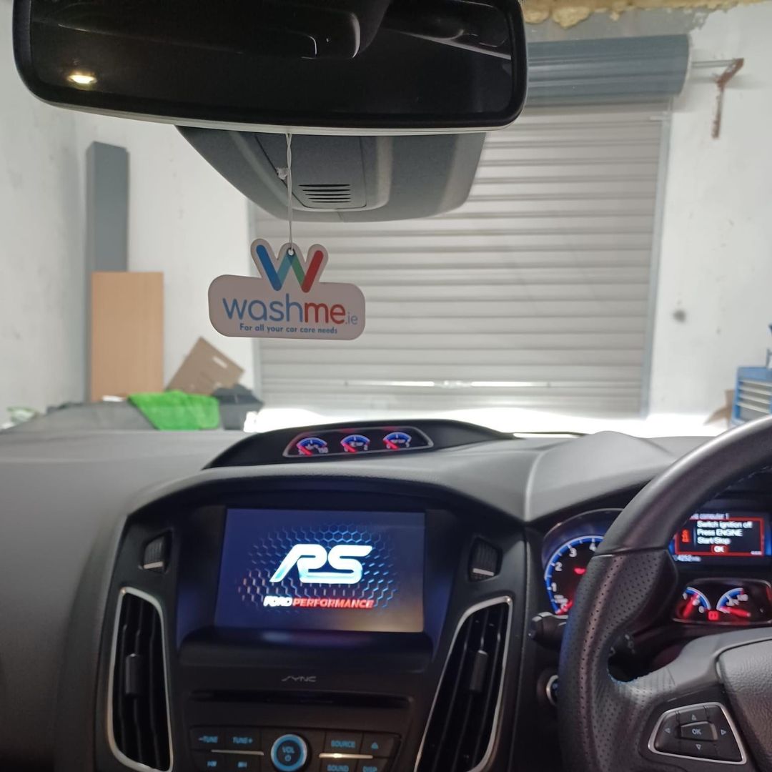 Ford Focus RS interior with dashboard display and 'washme air freshener' hanging off mirror