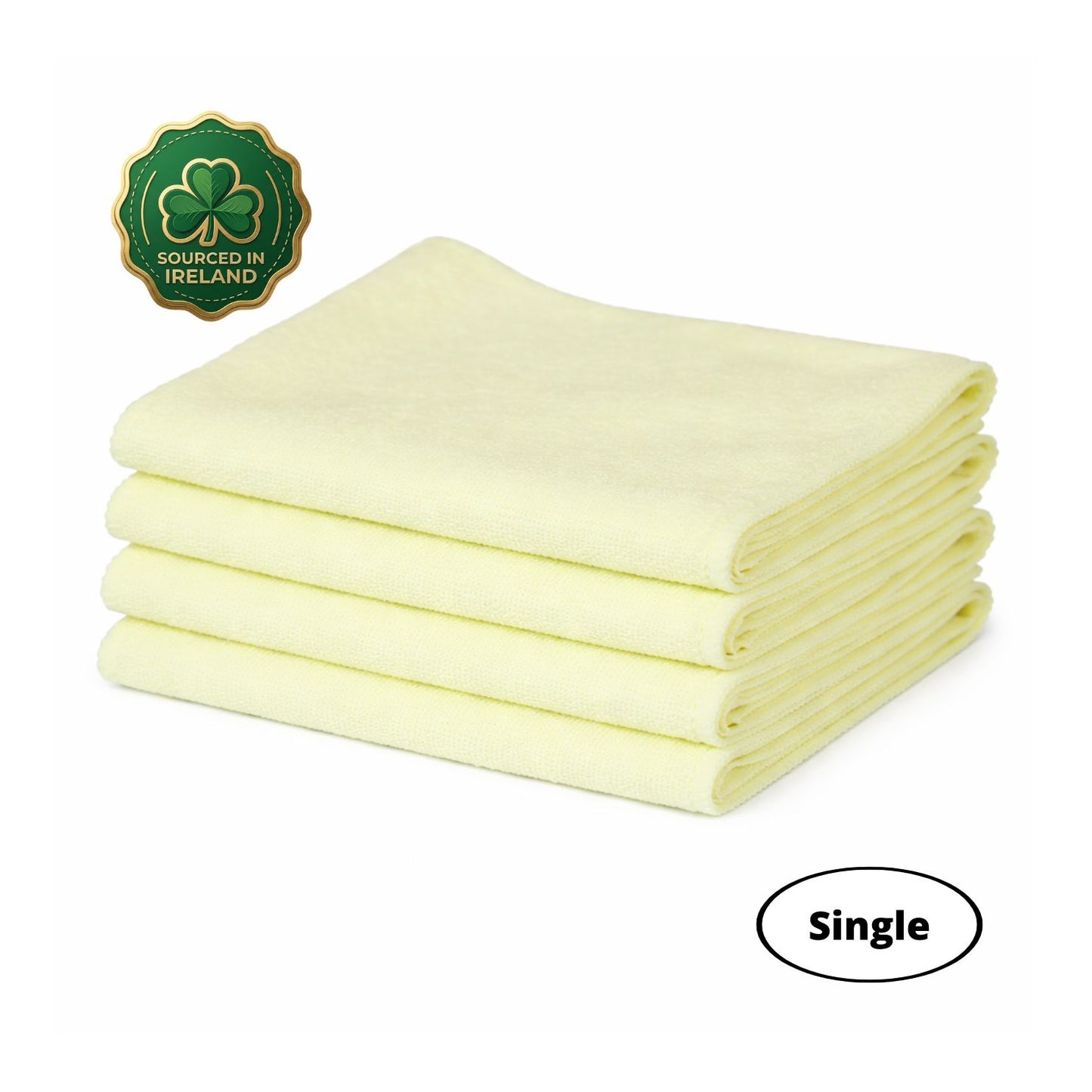 Stack of folded yellow washme microfibre cloths with a shamrock logo and 'Sourced in Ireland' text on a white background.