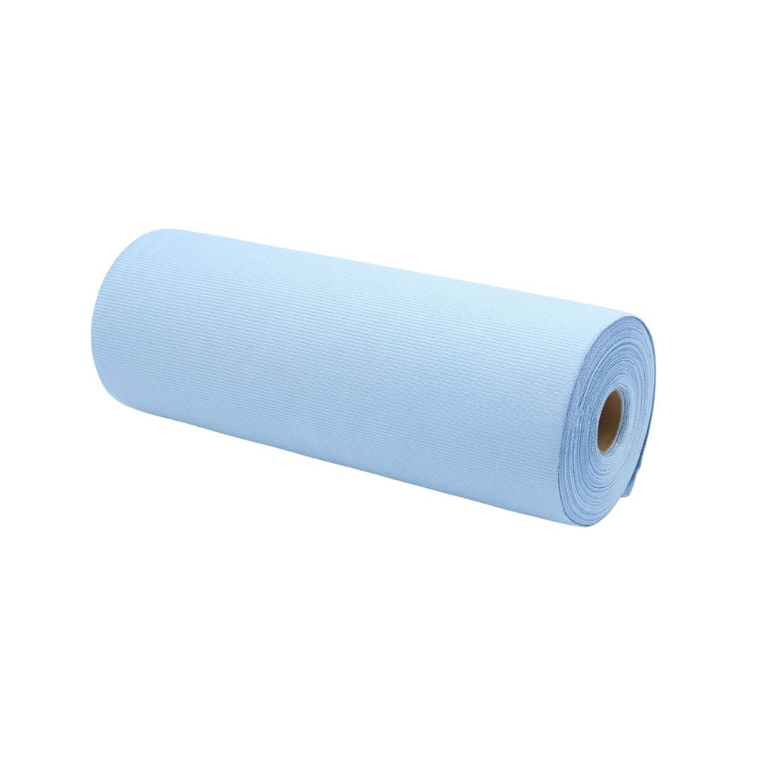 Roll of blue microfibre glass cloth on a white background