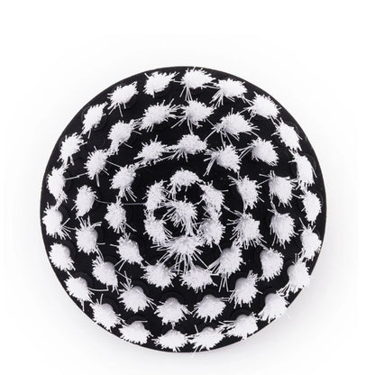 A cordless brush attachment with a silver hex driver bit, black plastic collar, and white bristles, shown on a plain white background.