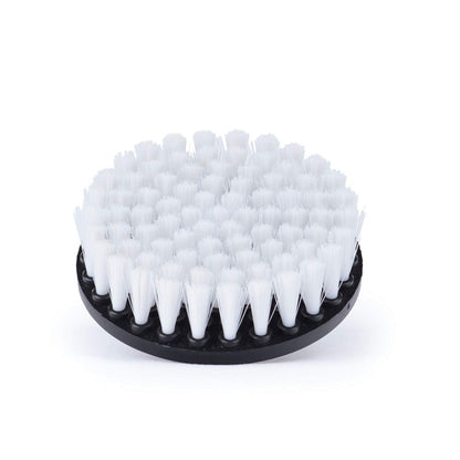 White bristle brush on a black base against a white background