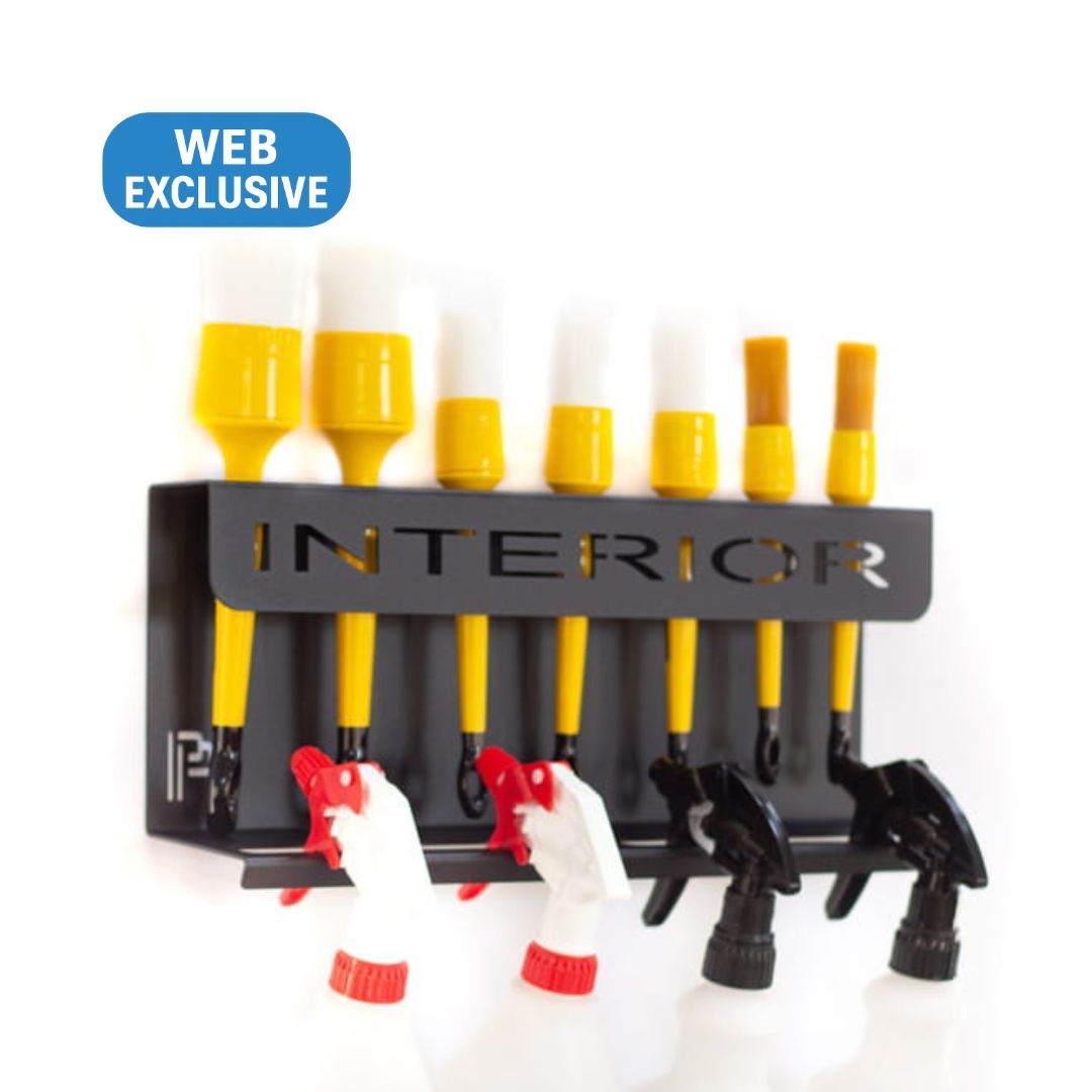 Set of cleaning tools with yellow nozzles and black and red attachments on a white background.