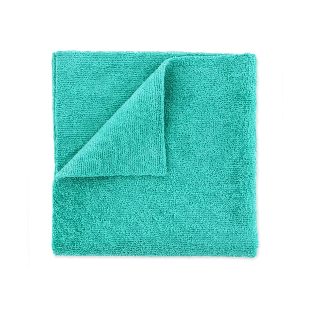 Turquoise microfibre folded on a white background