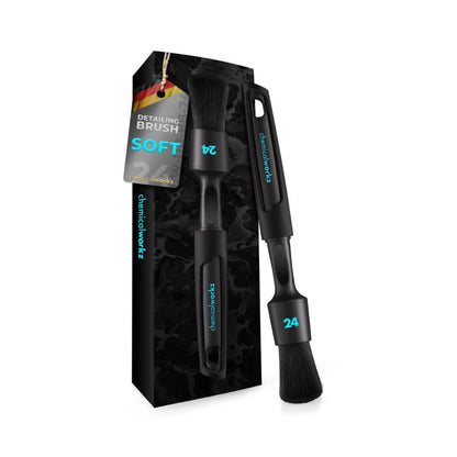 Black chemical boar detailing brush  in size 24 mm with packaging on a white background