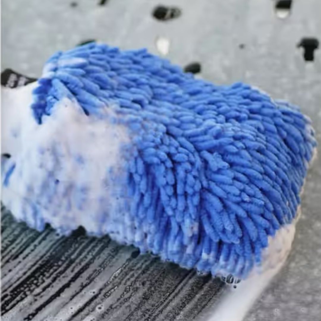 Blue and white chemicalworkz cleaning pad on a textured surface