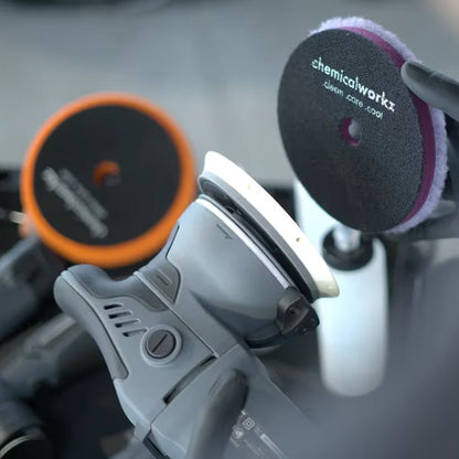 Car polisher with a 'chemicalworks' chemicalworkz DA15 on a blurred background