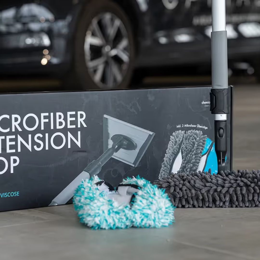 Microfiber extension mop with cleaning tools on a car wash platform