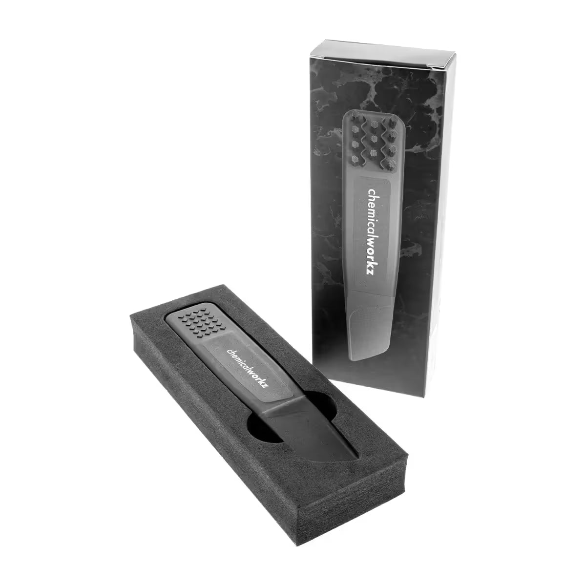 Black tool with 'chemicalworks' branding in a clear packaging on a white background