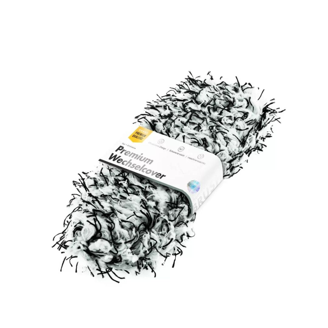 wheel brush with black bristles and a white handle on a white background