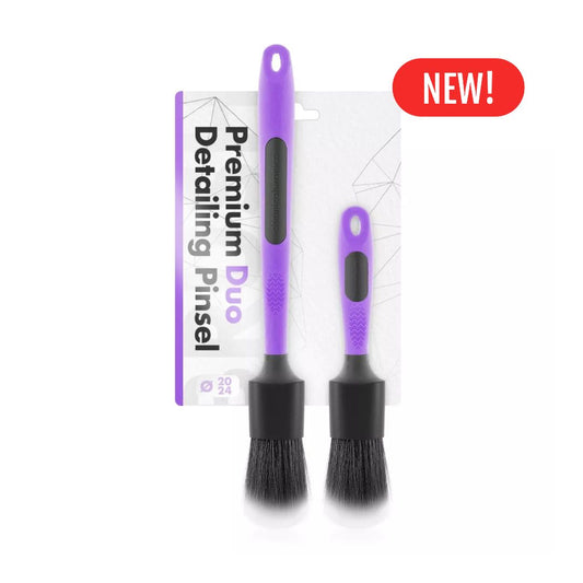 Two chemicalworkz ultra soft detailing brushes with purple handles and black bristles, accompanied by their packaging on a white background with new label