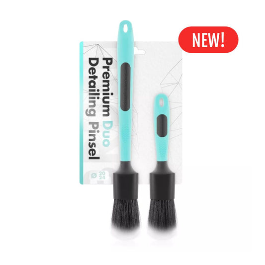 Two chemicalworkz ultra soft detailing brushes with Turquoise handles and black bristles, accompanied by their packaging on a white background.